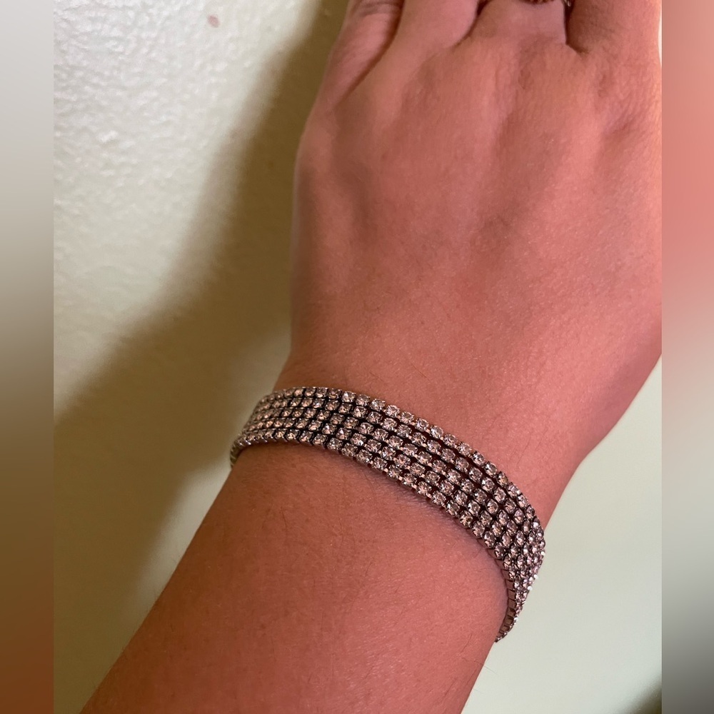 Elegant four strand Silver Bracelet with sparkly stones